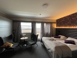 Superior Quadruple Room, Multiple Beds | Living area | 40-inch TV with satellite channels