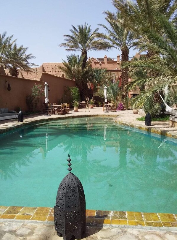 Outdoor pool, pool umbrellas, pool loungers