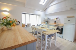 Dishwasher, highchair, cookware/dishes/utensils