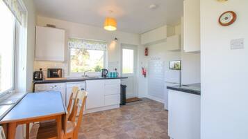 Dishwasher, high chair, cookware/dishes/utensils