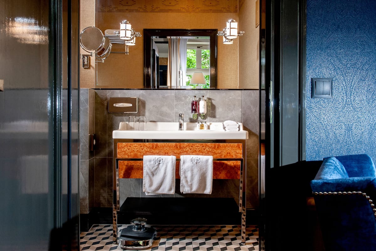 shower, designer toiletries, hair dryer, bathrobes