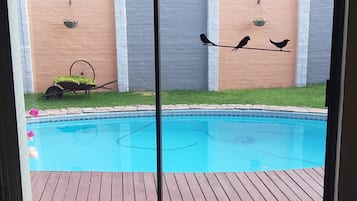 Seasonal outdoor pool, open 9:00 AM to 10:00 PM, sun loungers