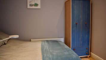 2 bedrooms, premium bedding, laptop workspace, iron/ironing board