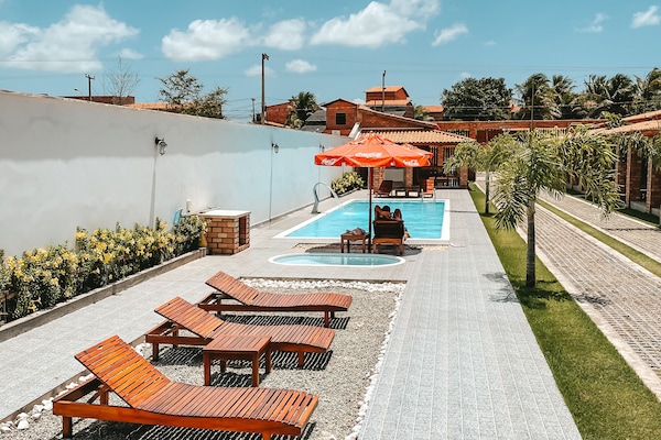 Indoor pool, pool umbrellas, sun loungers