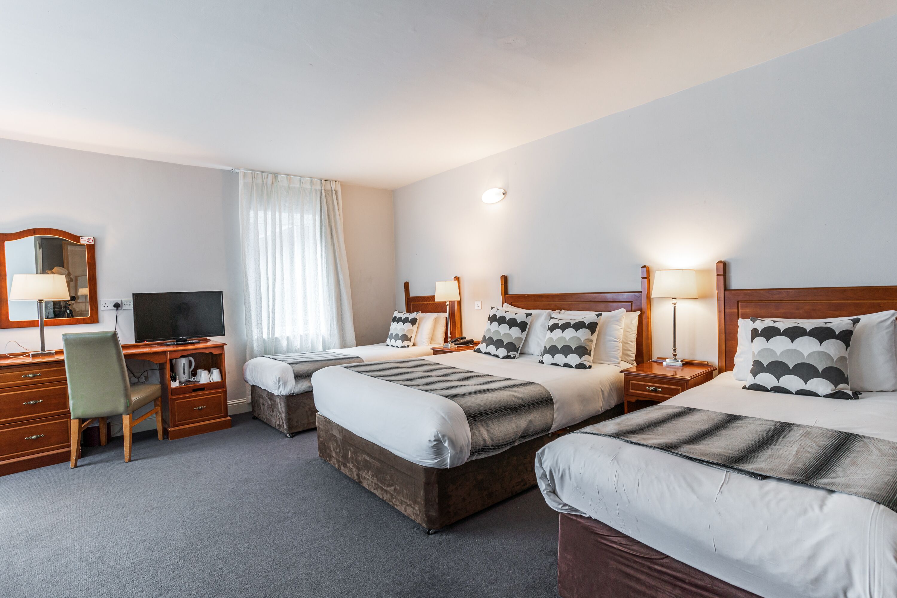 family room | in-room safe, desk, laptop workspace, iron/ironing board