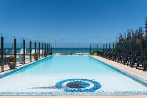 Outdoor pool, open 10:00 AM to 8:00 PM, sun loungers