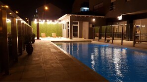 Outdoor pool, open 10:00 AM to 8:00 PM, pool loungers
