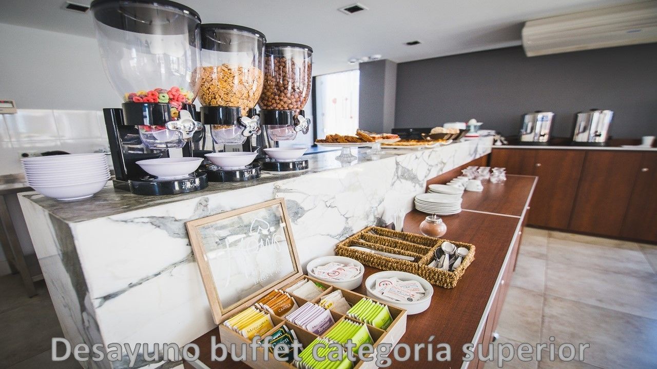 A buffet setup with various food dispensers, bowls, and trays.