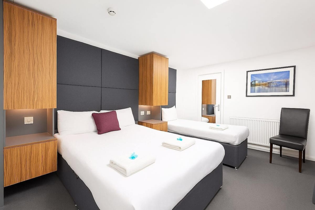 Suite, Shared Bathroom (Triple 1 Double/1 Single) | Individually decorated, individually furnished, laptop workspace