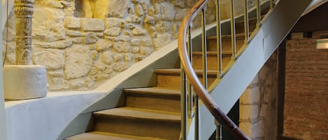 Desk, blackout curtains, soundproofing, cots/infant beds