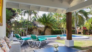 Outdoor pool, open 8:00 AM to 6:00 PM, pool loungers