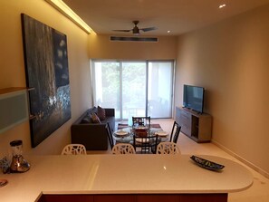 Apartment | Living area | Flat-screen TV - Pleasant 1BR a few step away from the beach by Happy Address (Playa del Carmen)