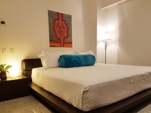 Apartment | 2 bedrooms, in-room safe, iron/ironing board, free WiFi - Comfortable 2 BR condo steps away from 5th Av and Mamitas Beach by Happy Address (Playa del Carmen)