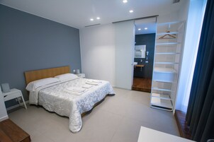 Desk, blackout curtains, soundproofing, free cots/infant beds