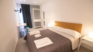 Desk, blackout curtains, soundproofing, free cots/infant beds