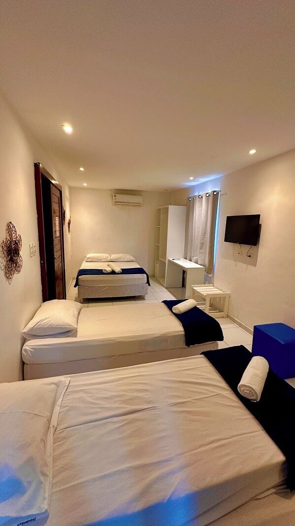 Quarto Quadruplo padrão | Minibar, in-room safe, desk, free WiFi - Pousada Paranambuca (Ipojuca)