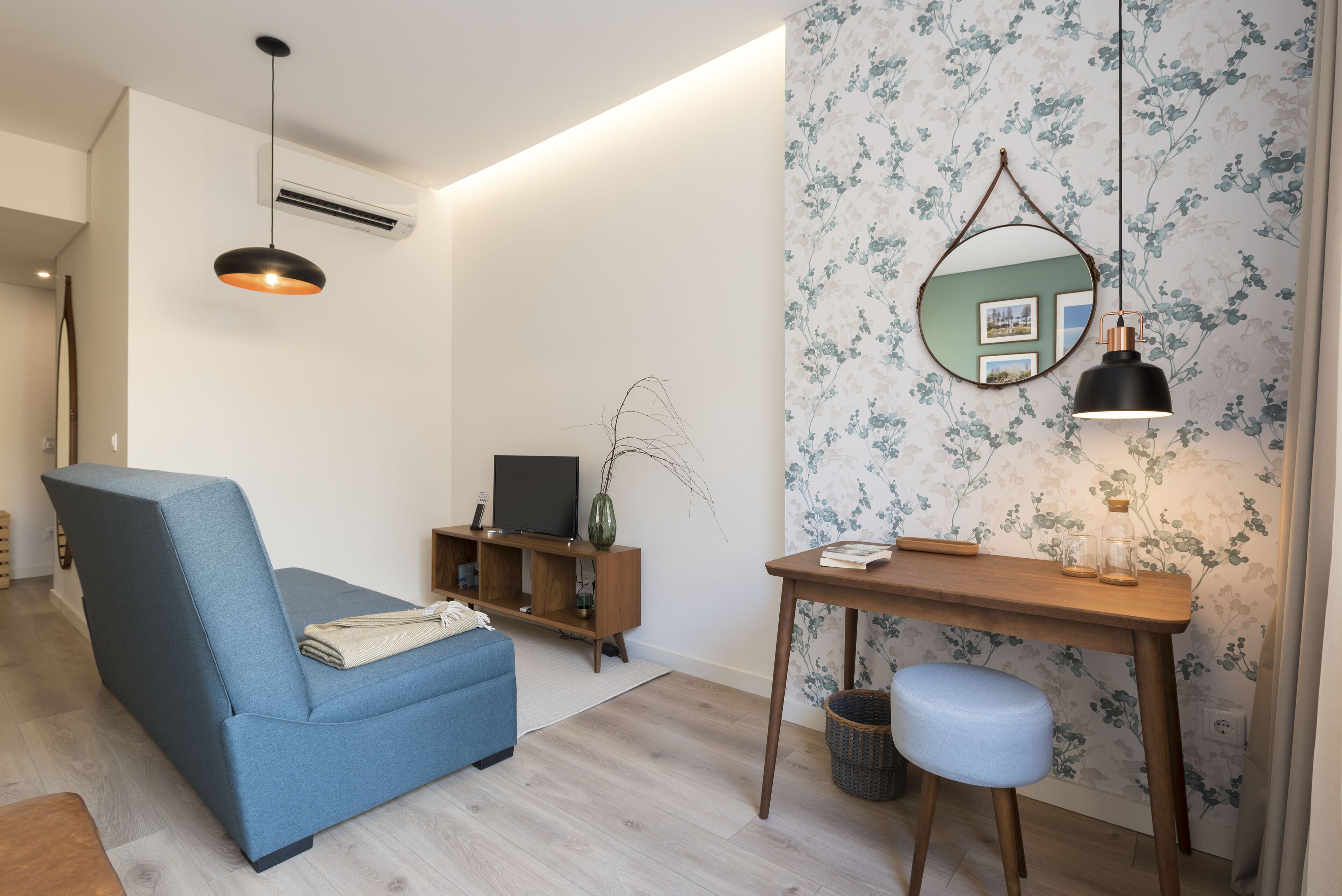 family studio, garden view | living area | flat-screen tv