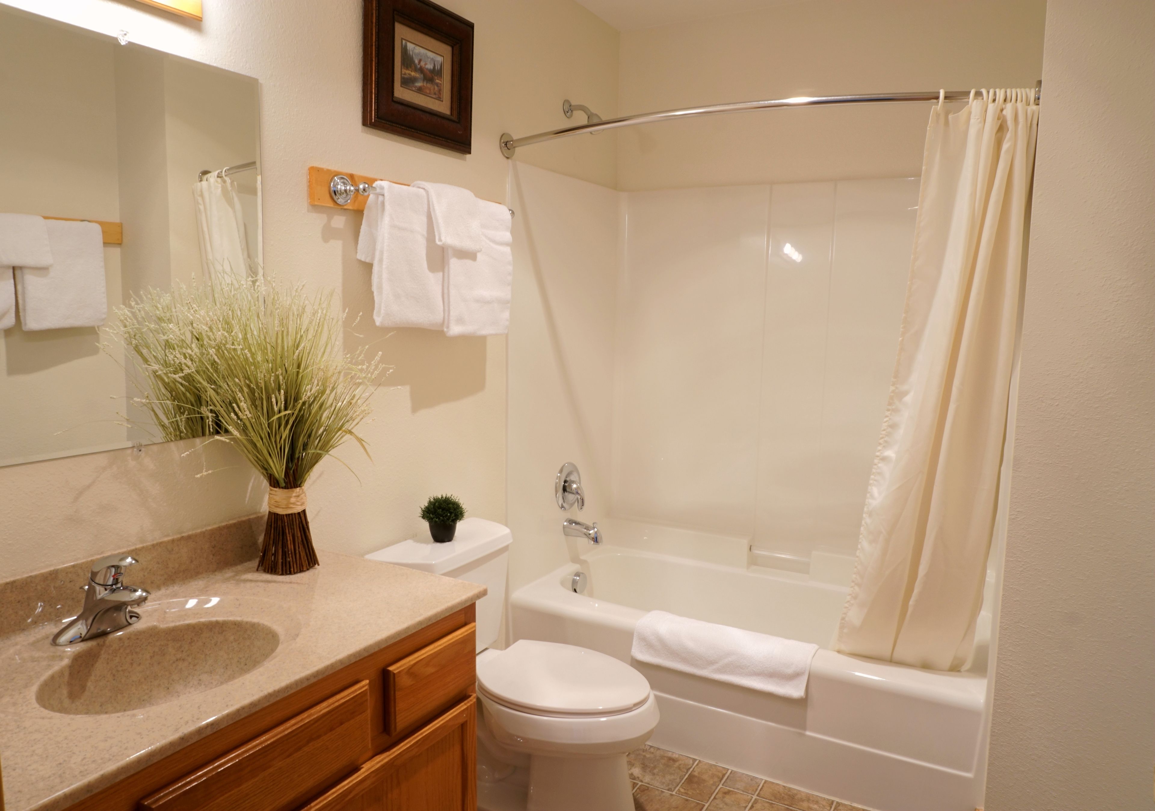 superior townhome, multiple beds, non smoking | bathroom | combined shower/bathtub, free toiletries, hair dryer, towels