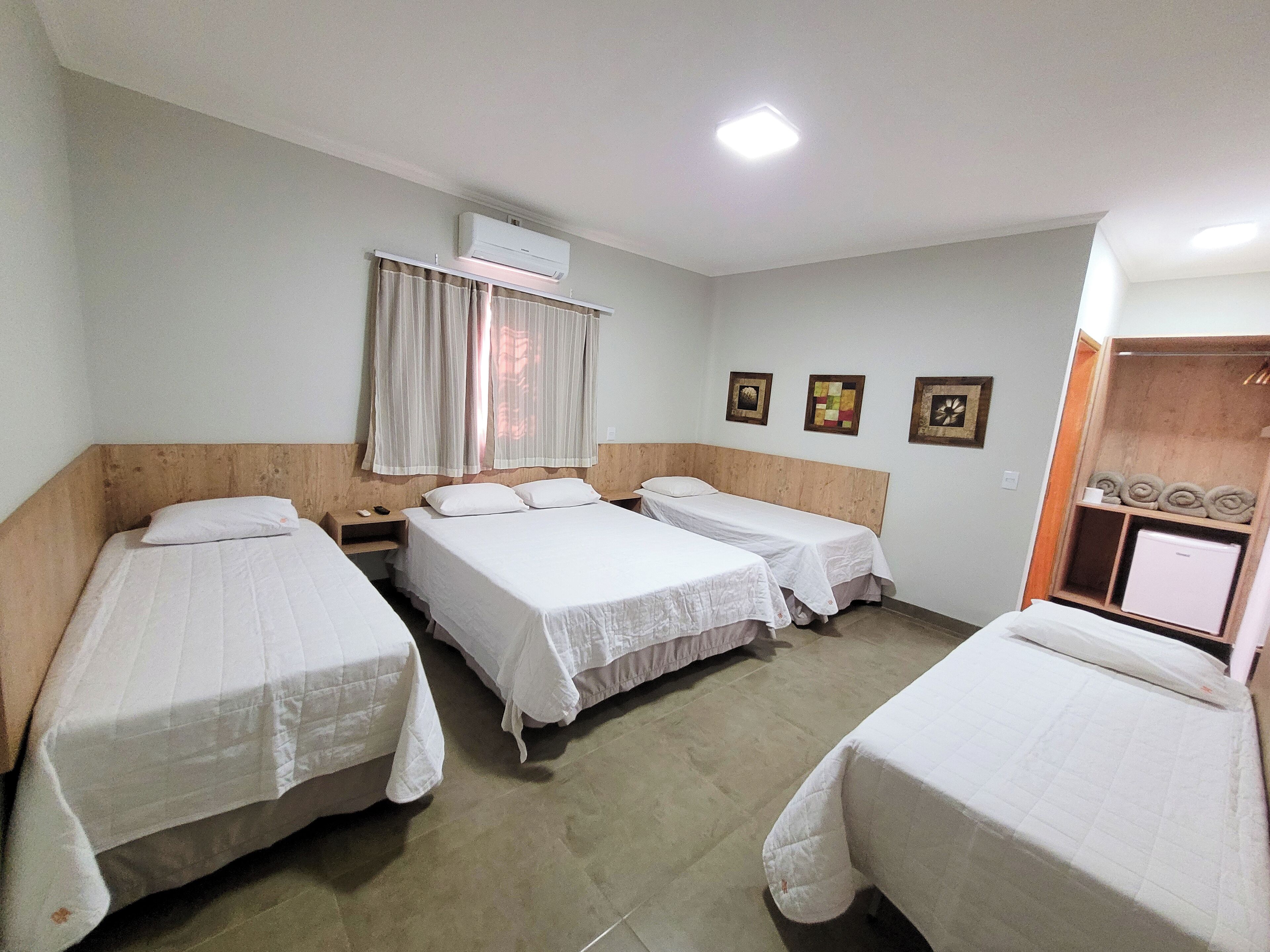 Deluxe Quadruple Room, Non Smoking | Minibar, iron/ironing board, free WiFi, bed sheets