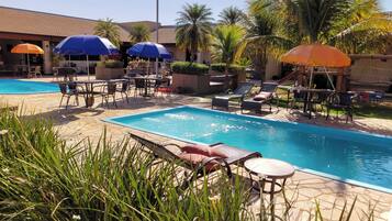 2 outdoor pools, open 8:00 AM to 10:00 AM, pool umbrellas, sun loungers