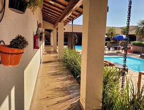 Premium bedding, minibar, blackout drapes, iron/ironing board