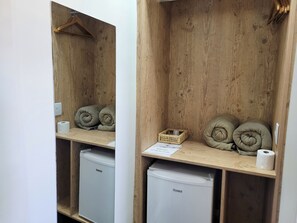 Premium bedding, minibar, blackout drapes, iron/ironing board