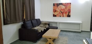 Classic-Apartment, Mehrere Betten, Nichtraucher, Gartenblick | Wohnbereich