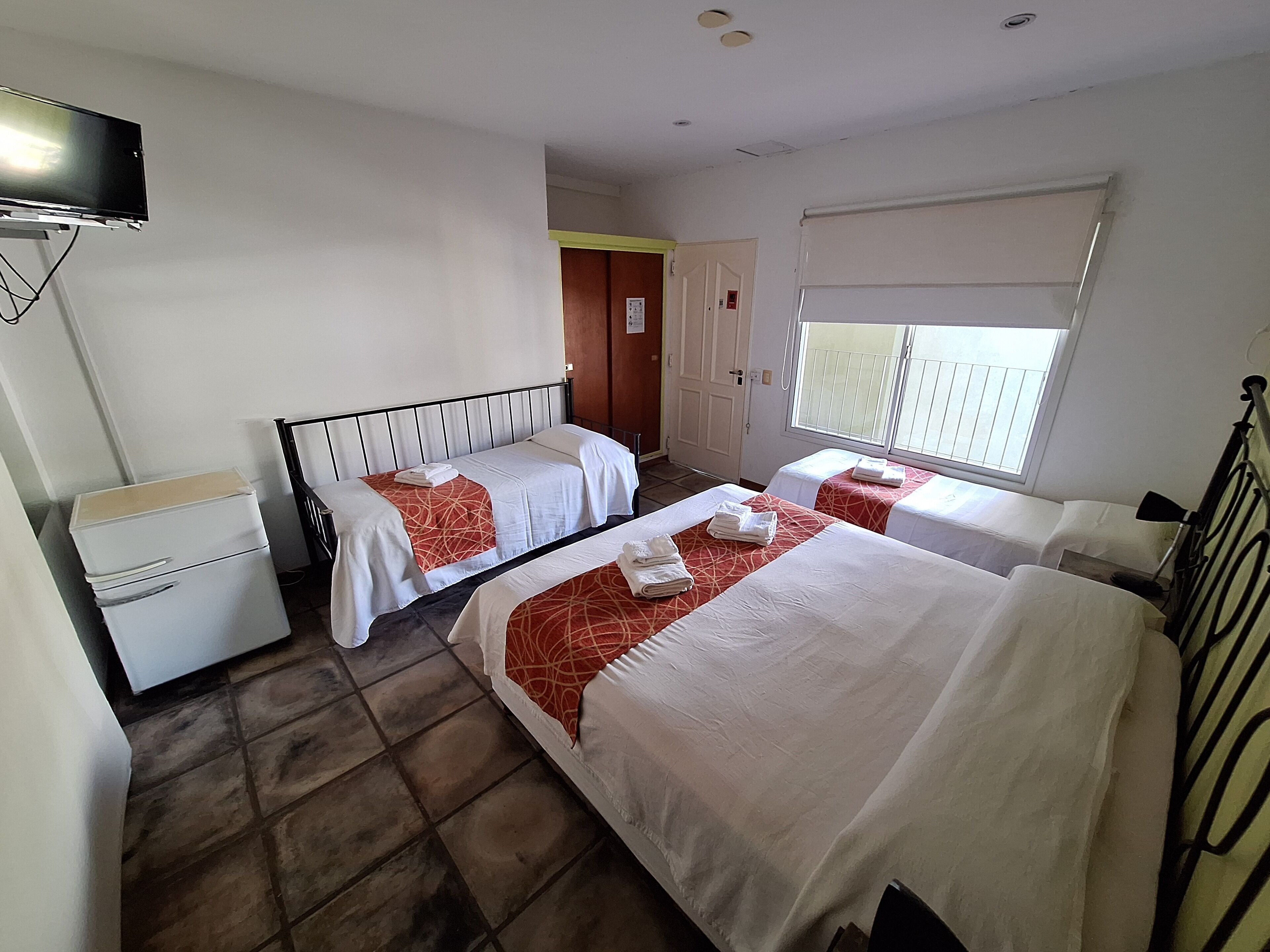 desk, blackout curtains, free wifi, bed sheets