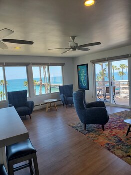 Executive Penthouse, 2 Bedrooms, Ocean View | Living area | 32-inch flat-screen TV with cable channels, TV at Sea Horse Resort
