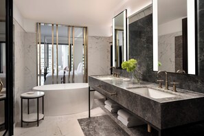 Designer toiletries, hair dryer, bathrobes, slippers