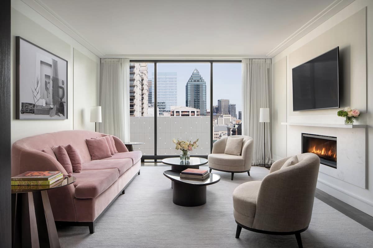 Enjoy a city view from the large window, relax by the fireplace, and unwind with a flat-screen TV.