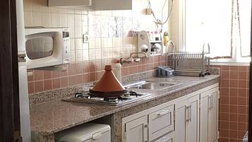 Apartment, 2 Bedrooms, Non Smoking | Private kitchen | Fridge, microwave, stovetop, coffee/tea maker