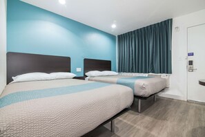 Desk, laptop workspace, free WiFi, bed sheets