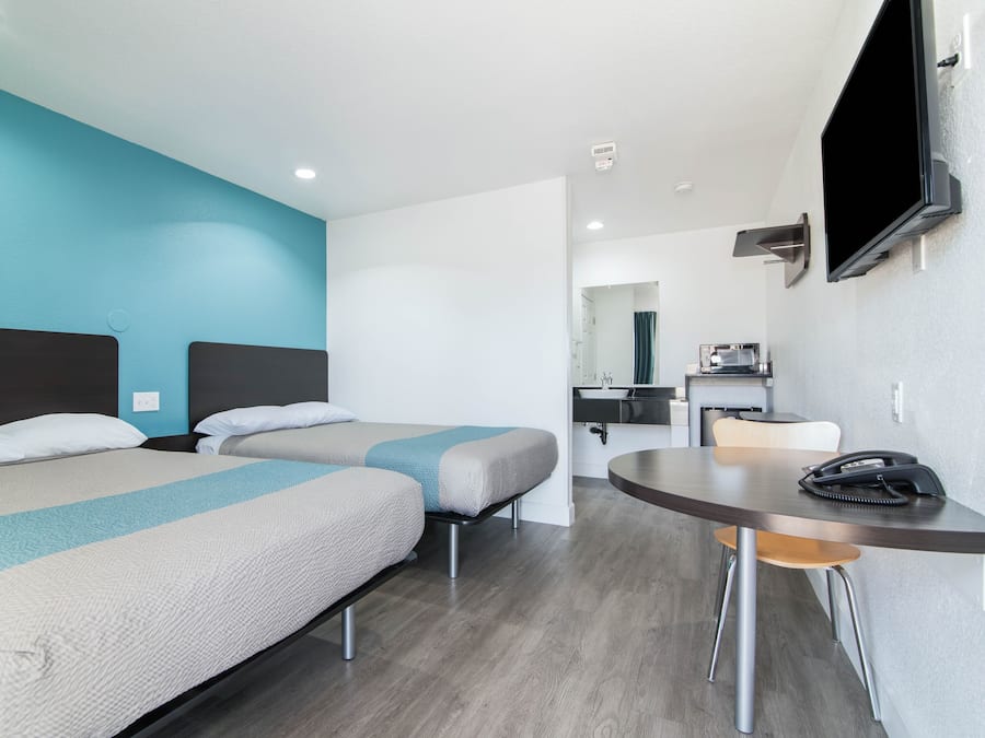 Desk, laptop workspace, free WiFi, bed sheets