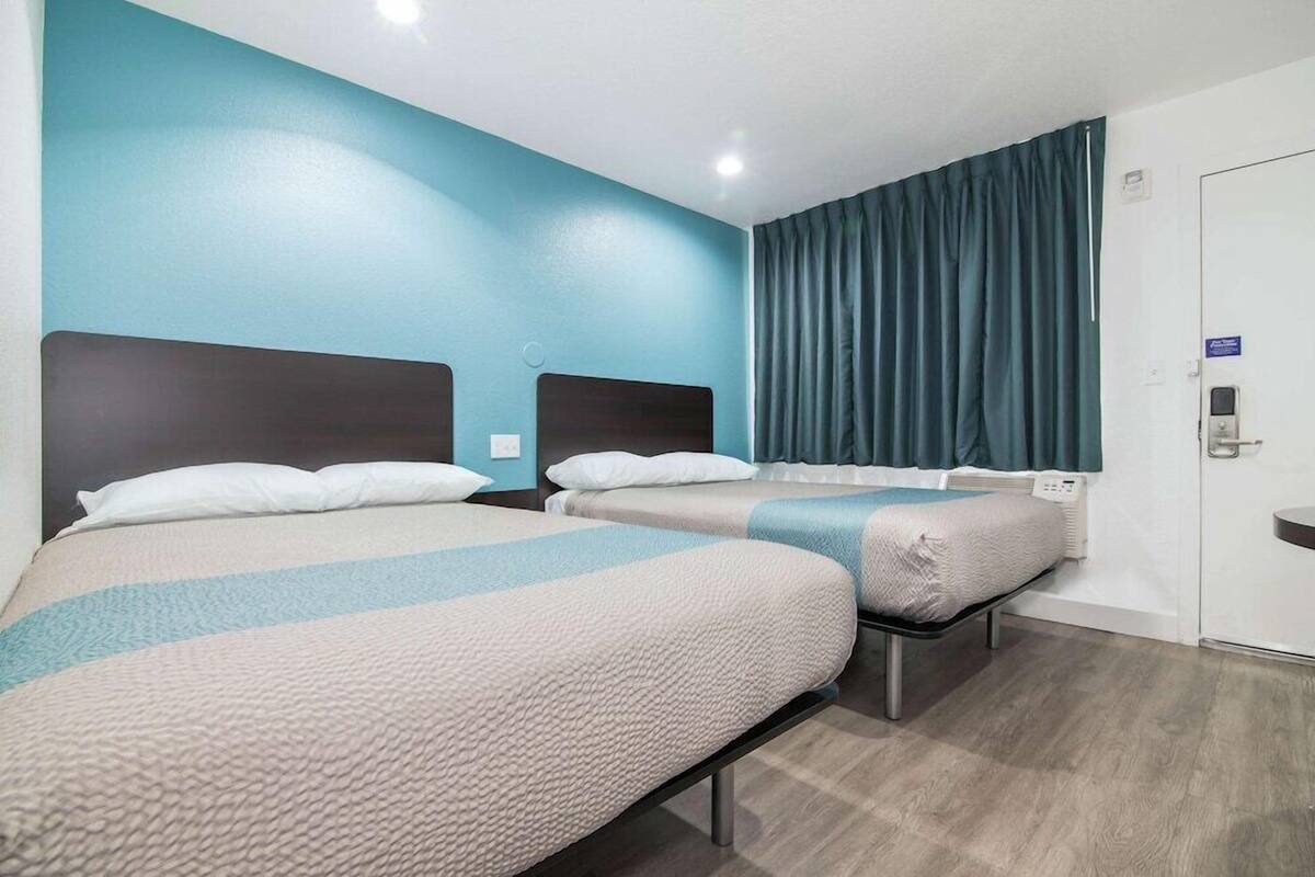 Desk, laptop workspace, free WiFi, bed sheets