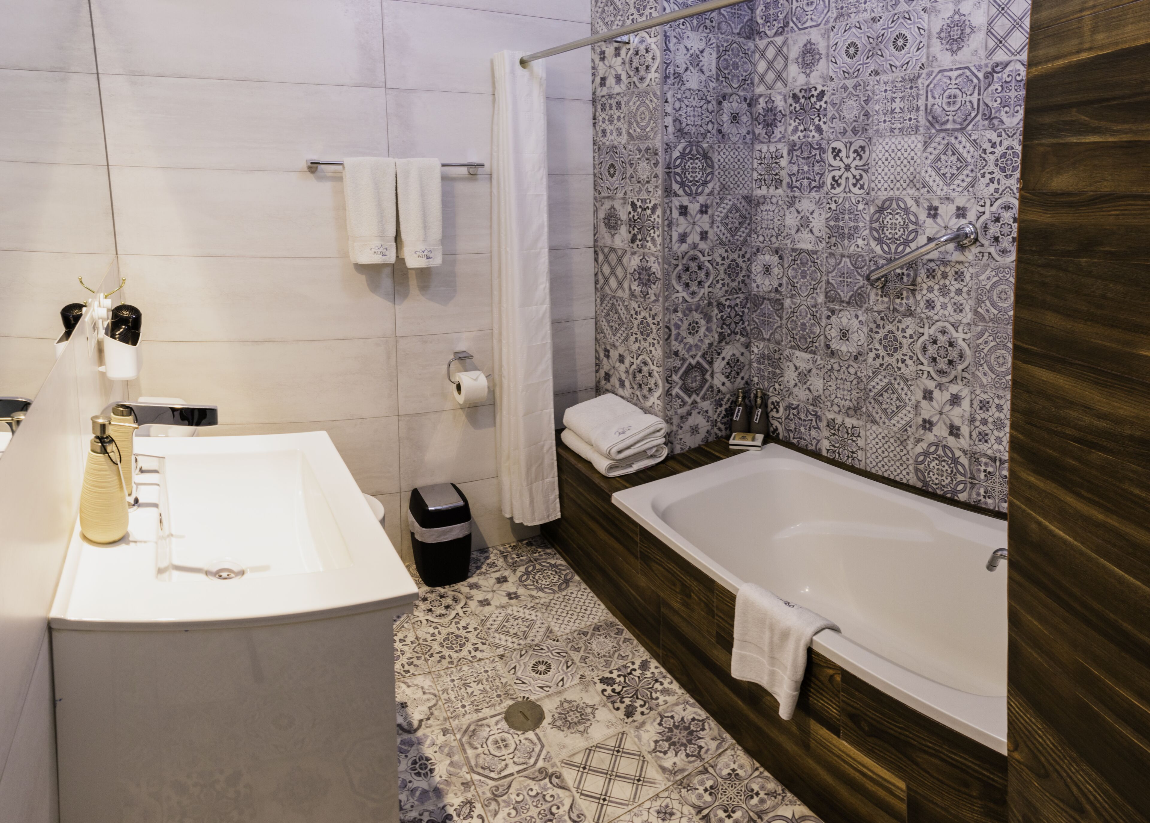 bathtub, free toiletries, hair dryer, towels