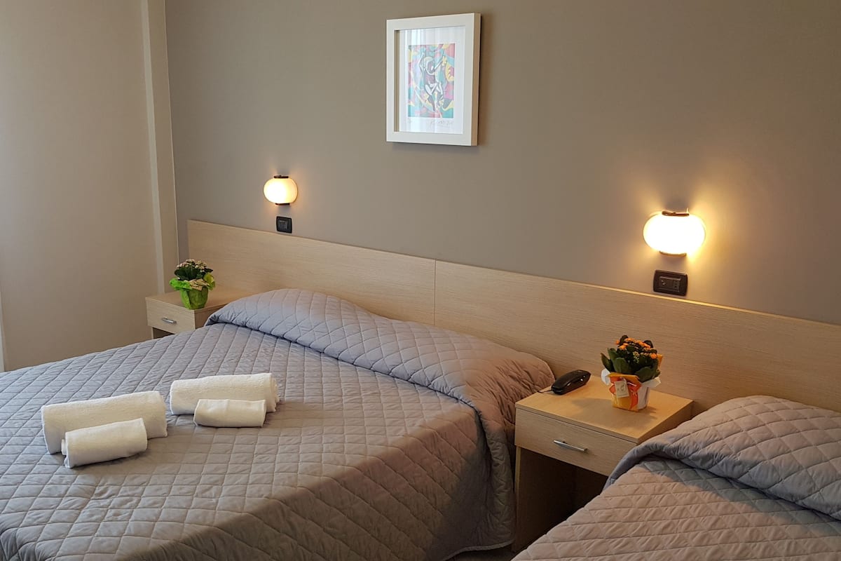 triple room, sea view | in-room safe, desk, blackout curtains, soundproofing