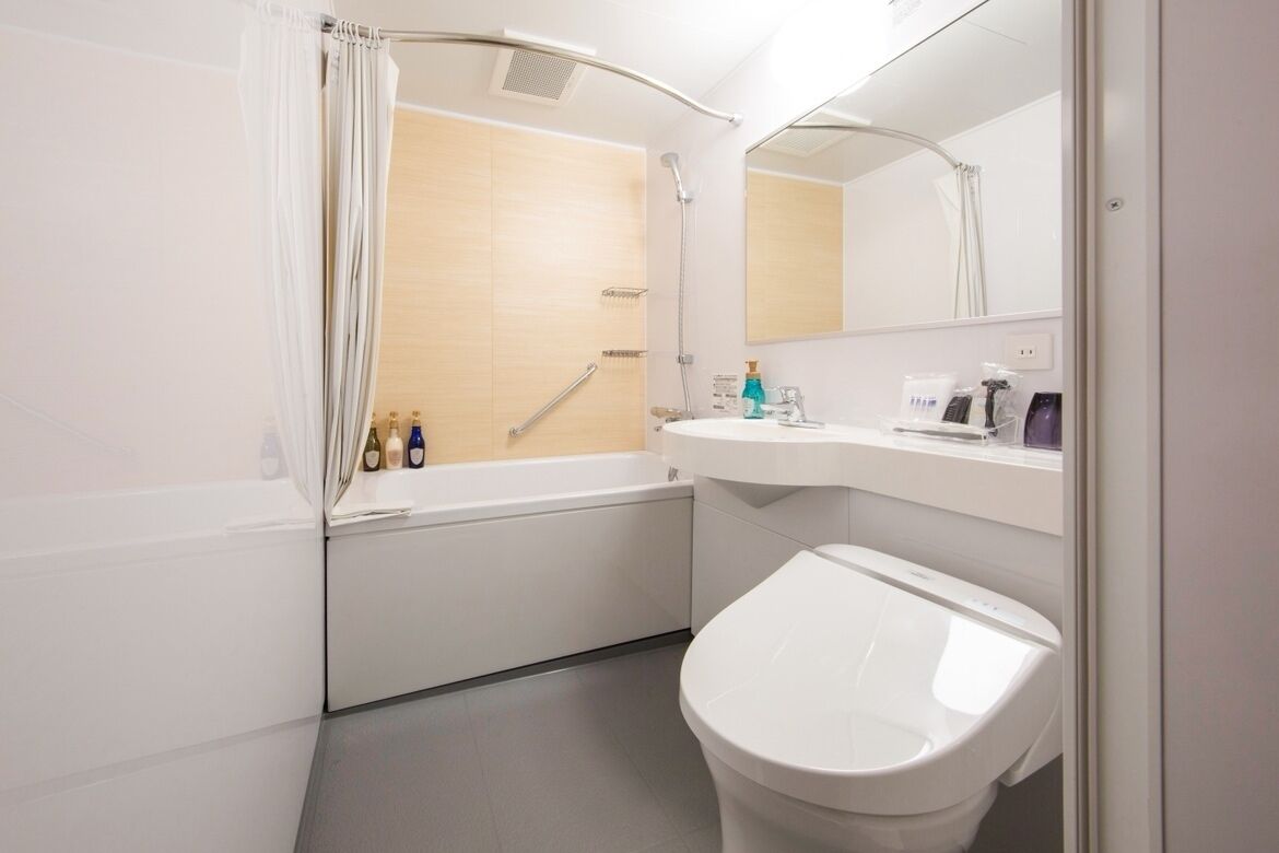 free toiletries, hair dryer, slippers, bidet