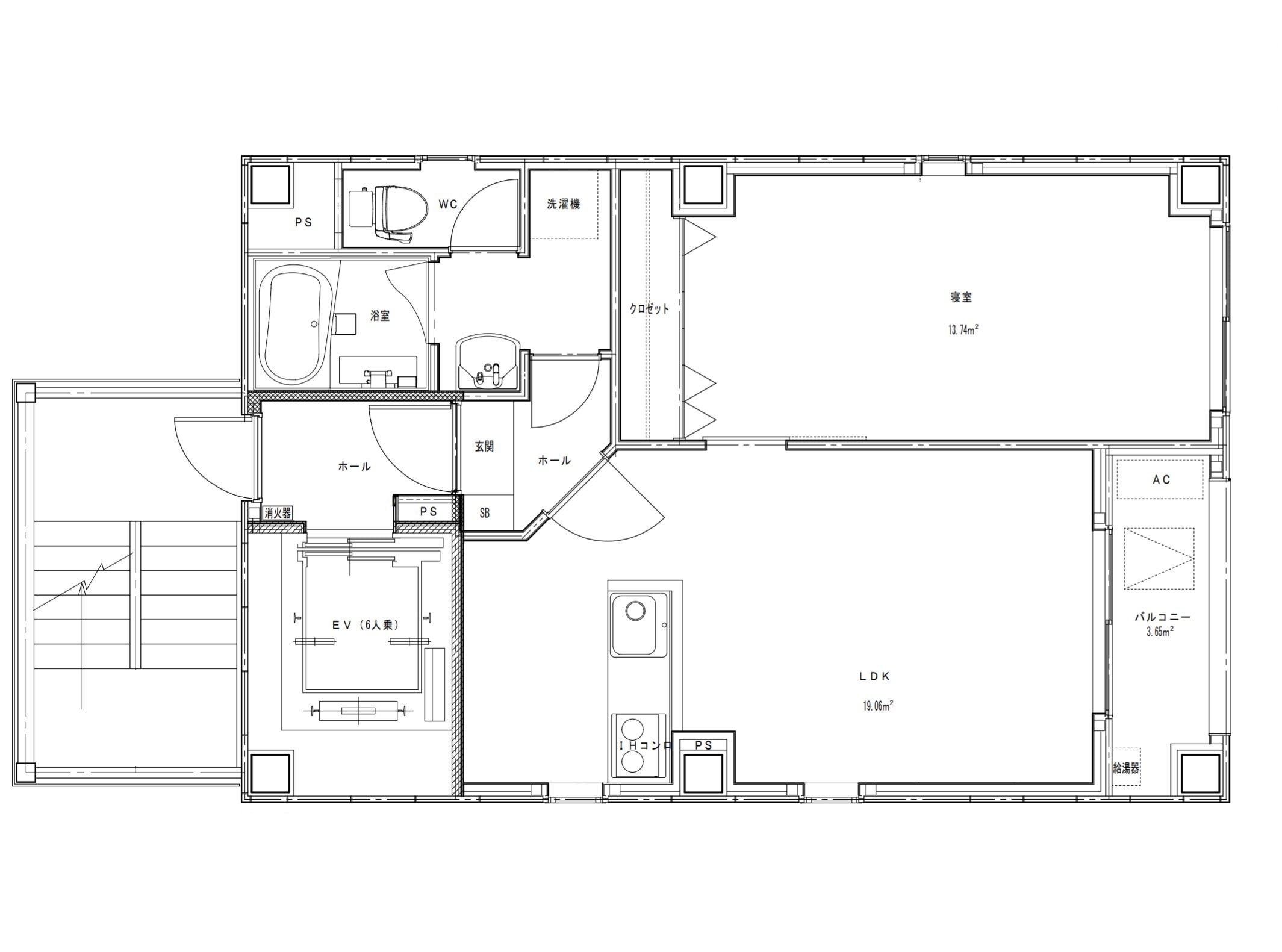 Un plan d’étage d’un hôtel comprenant un salon, une chambre, une salle de bain et une cuisine.