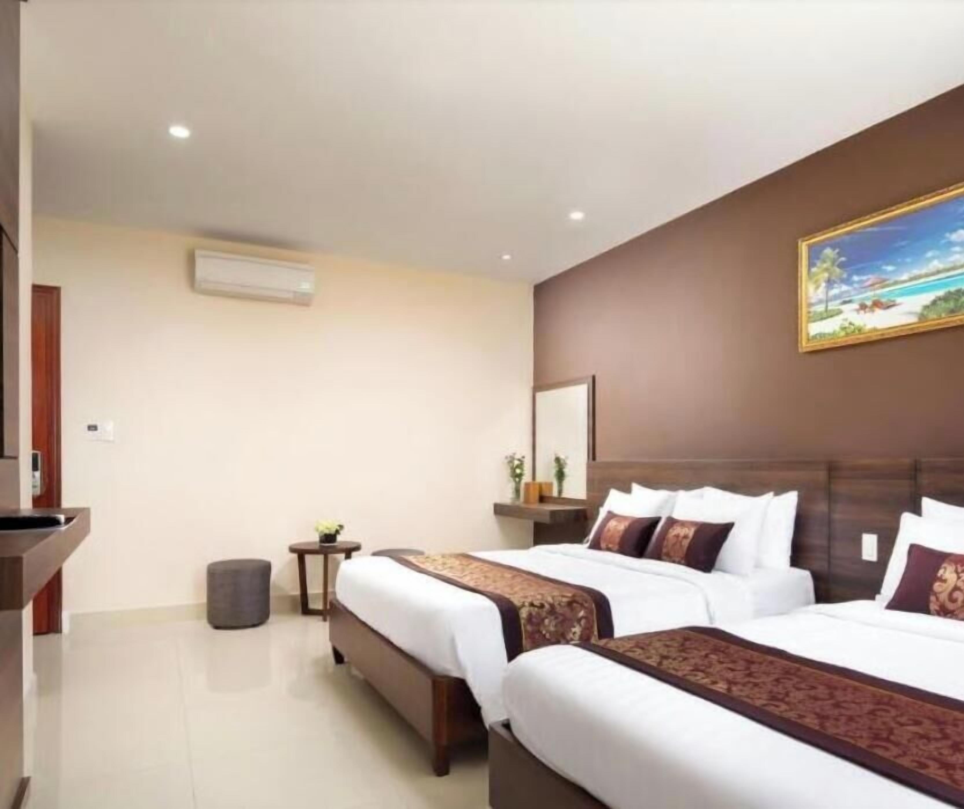 Superior Triple Room, No Windows | Minibar, in-room safe, desk, blackout drapes