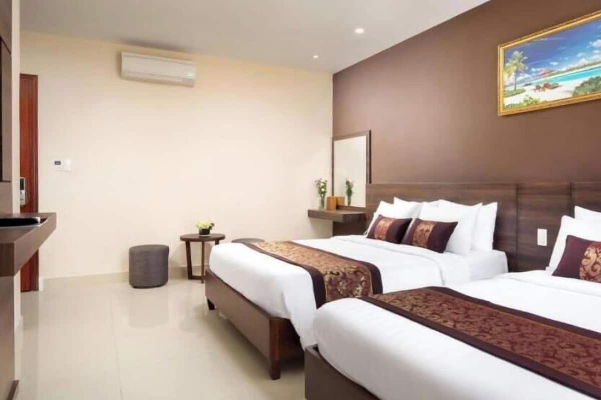 Superior Triple Room, No Windows | Minibar, in-room safe, desk, blackout drapes