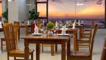 Breakfast, lunch, dinner served; local and international cuisine