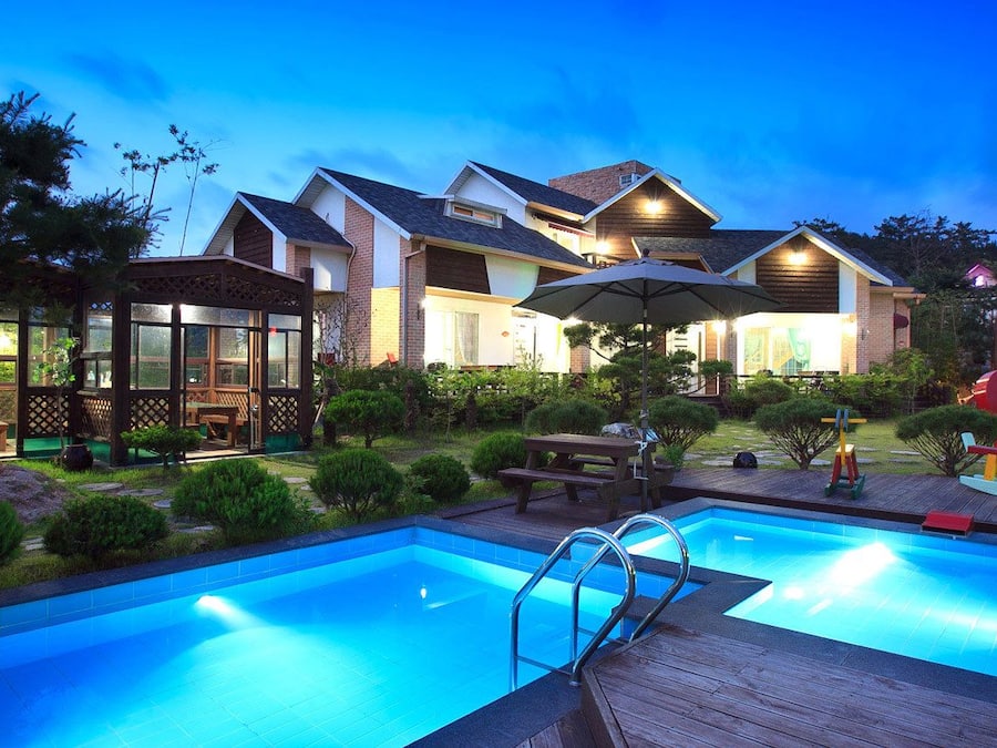 Seasonal outdoor pool, open 11:00 AM to 8:00 PM, pool umbrellas