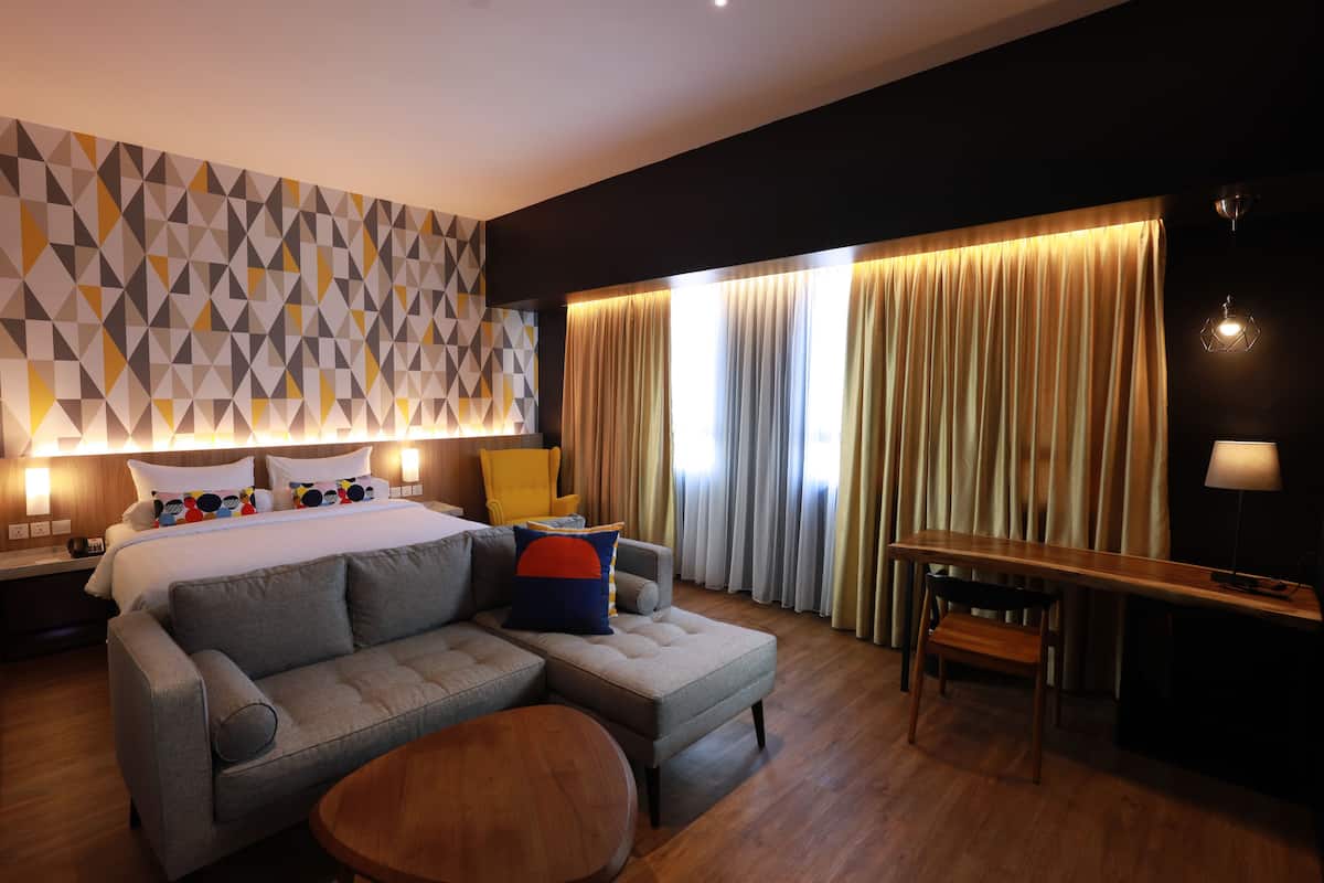 Junior suite, 1 tweepersoonsbed | 1 slaapkamer, een minibar, een kluis op de kamer, een bureau