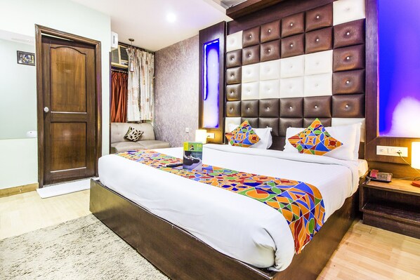 Chambre Deluxe, 1 lit double, non-fumeurs | Coffres-forts dans les chambres, lits pliants/supplémentaires