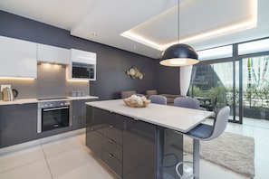 Comfort Apartment, 1 King Bed, Non Smoking | Private kitchen | Fridge, microwave, oven, stovetop - The Chelsea 105 - Adults Only (Cape Town)