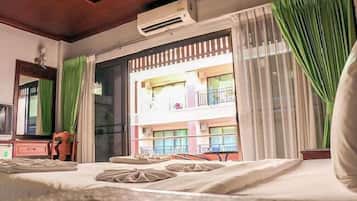 Deluxe Double Room, Balcony | In-room safe, desk, laptop workspace, blackout drapes