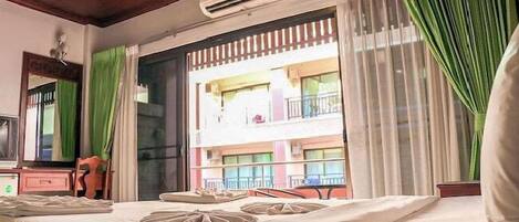 Deluxe Double Room, Balcony | In-room safe, desk, laptop workspace, blackout drapes