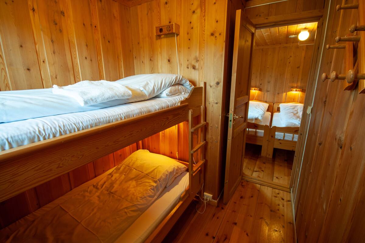 traditional apartment, multiple beds, mountain view | desk, laptop workspace, free wifi, bed sheets