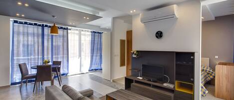 Apartment, 1 Bedroom, Balcony | Living area | LCD TV
